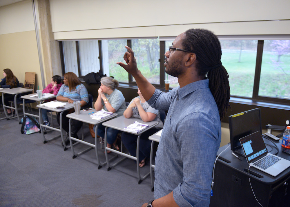 A Deaf Studies teacher in a classroom